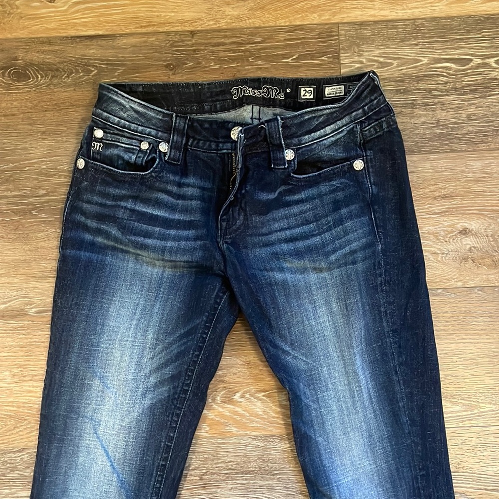 Miss Me Signature Ankle Skinny Jeans with jeweled embroidered hem.